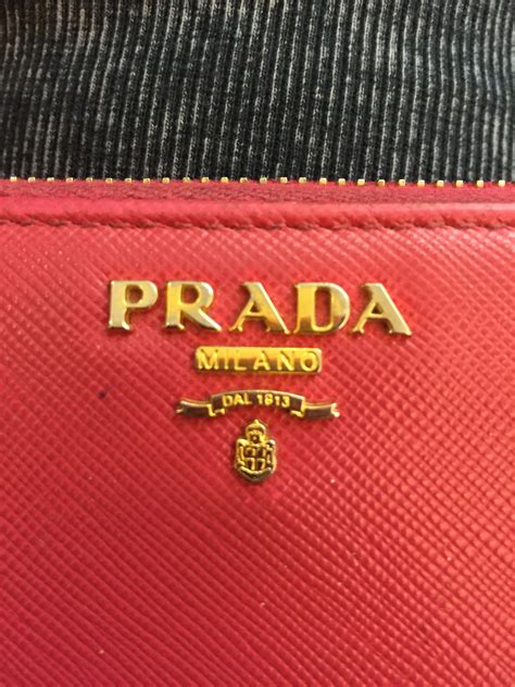 prada wallet interior fake vs real|Prada wallet authenticity.